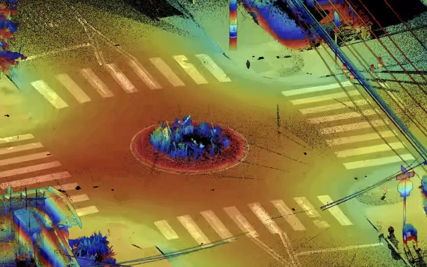 Elevation-colored point cloud of a street intersection with curb ramps and crosswalks, scanned by Contour Survey
