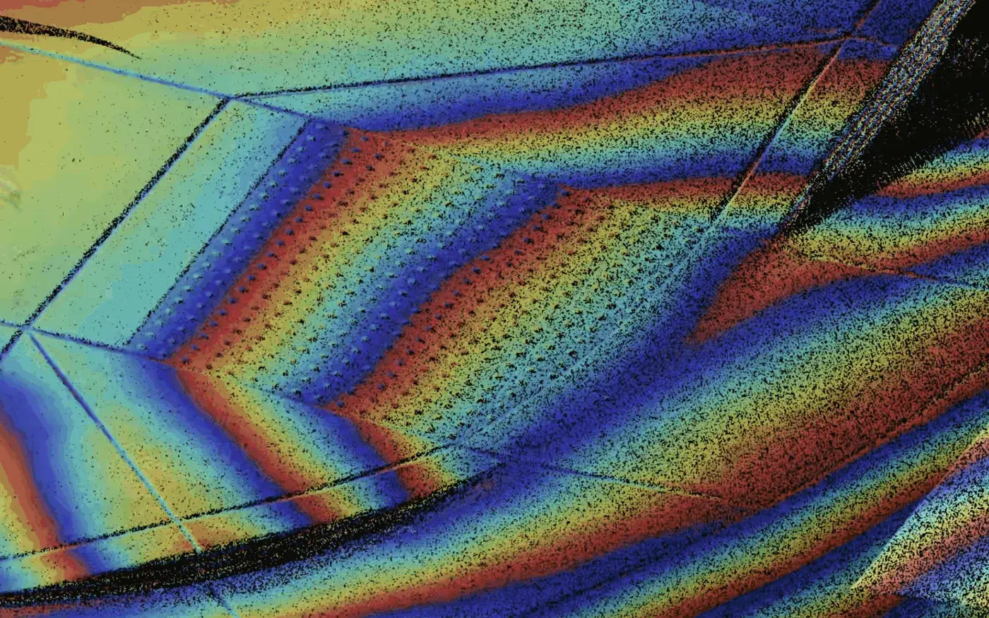 Curb ramp point cloud shaded in repeating elevation bands that trace its slopes and cross slopes, scanned by Contour Survey