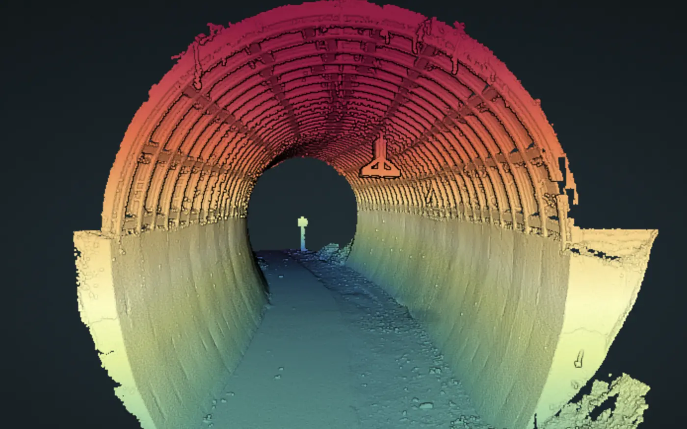 Same tunnel point cloud colored by elevation, from invert to crown