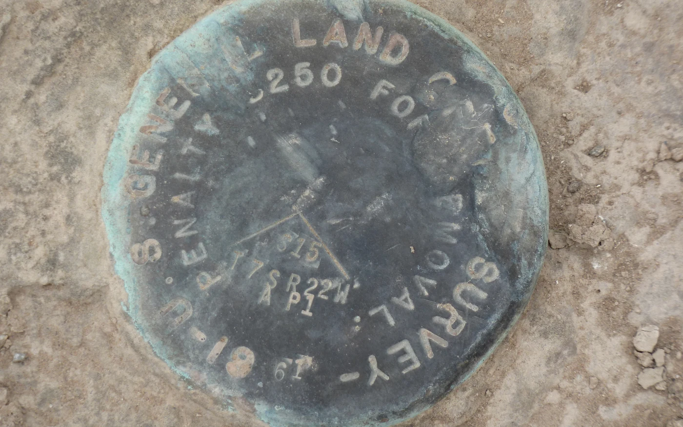 Recovered survey monument in the ground, the boundary evidence a setback certification survey is measured from